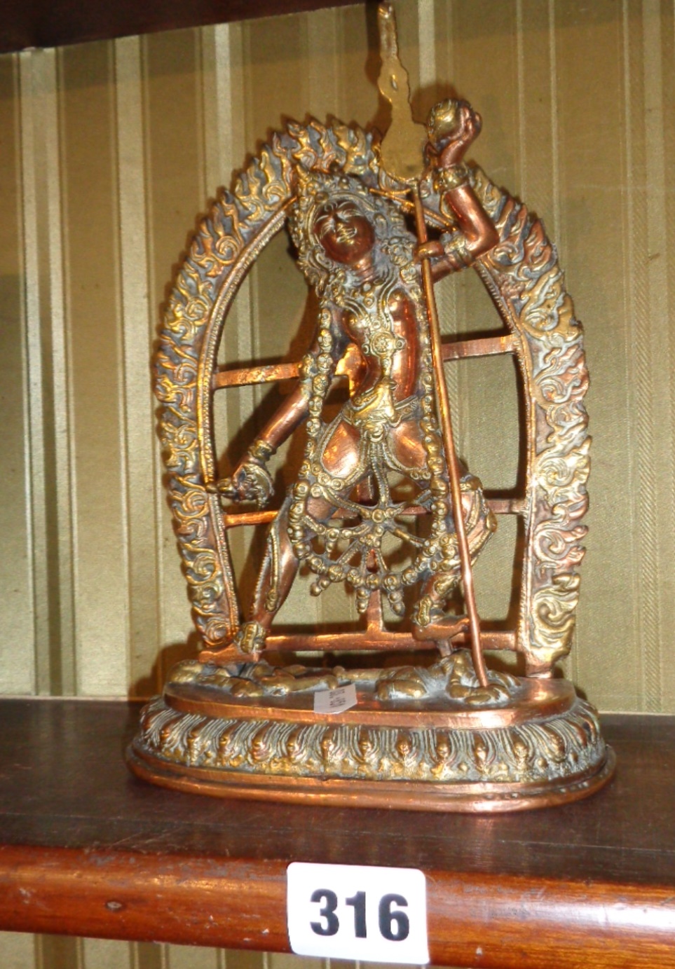 Tibetan bronze dancing buddha with sword