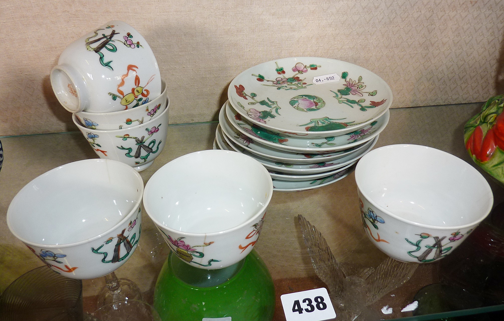 Six Chinese porcelain Famille Rose tea bowls and saucers