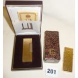 Gold plated Dunhill Rollagas lighter in lightly used condition, in original case with paperwork, and