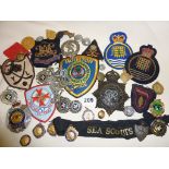 Assorted vintage police cap badges etc., inc. Metropolitan, military bullion badges, buttons,