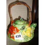 Japanese earthenware teapot with bamboo handle. Decorated with colourful naturalistic frogs and