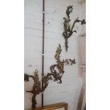 Three gilt brass Rococo style two-branch wall lights (c. early 20th c.)