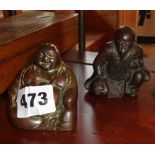 Two Chinese miniature heavy bronze seated figures (possibly scroll weights)