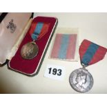 Two ER2 Imperial Service medals, one in case, named to a Mrs Elsie May Leroy and a Harold Leslie