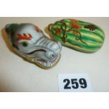 Two Chinese porcelain snuff bottles, one shaped as a dragon's head, the other as a gourd, both