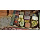 Box of old tins and some cut glass wine glasses