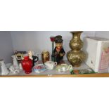 Shelf of assorted china, pottery, a tinplate drunk with lamp-post and an Oriental brass vase