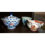 An antique Chinese porcelain libation cup, a blue and white tea bowl with cover, and another