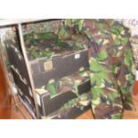 Three boxes of Army camouflage parkas and other similar outfits