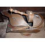 Victorian copper coal helmet and shovel together with a pair of wooden bellows