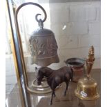 Bronze temple bell on stand, Indian brass figural hand bell, Islamic copper vessel and an Asian