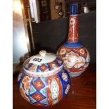 Japanese Imari bottle vase and a lidded pot