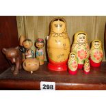 Russian Babushka doll, a carved wood bear etc