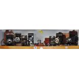 Seven various bellows cameras, two light meters, rangefinder and filters etc.