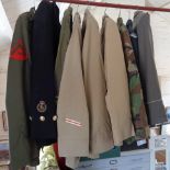 Nine various military uniform tunics