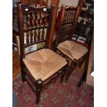 Set of six 19th c. spindle back dining chairs with rush seats, turned stretchers and turned legs