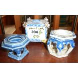 Chinese blue and white inkwell, another similar and a tin glazed Continental inkstand with floral