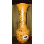 Oriental vase in yellow glaze with gilt floral decoration, four character marks