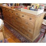 Large old pine sideboard or spice chest with 19 drawers - approx 6' long