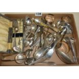 Assorted spoons and napkin rings, some silver, others plated