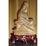 Chinese carved soapstone figure on stand