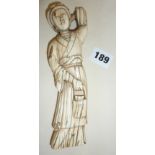 Early Chinese carved ivory figure of a woman (signed with character marks), approx. 19cm long