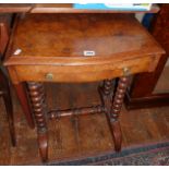 19th c. burr walnut work table having serpentine front and brass gallery to top standing on bobbin