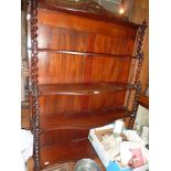 Victorian mahogany wall shelves having shaped shelves on barley twist column supports and fretwork