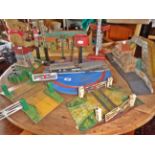 Hornby 0 Gauge tinplate station, a German tinplate similar, a signal box, two level crossings, a