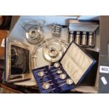 Box of silver-plated items, spoons, candle holders, pepper pots in case
