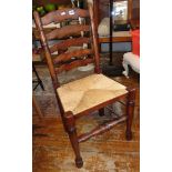 Set of four ladderback chairs with rush seats