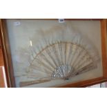 Embroidered silk and feathers fan with mother-of-pearl sticks and guards mounted in wall display