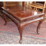 Mahogany coffee table with brushing slides on cabriole legs