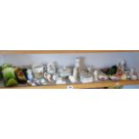 Shelf of assorted crested china, inc. Goss, some china and pottery shoe ornaments and others