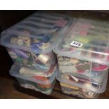 Four boxes containing vintage sewing bits, cotton reels, needle cases, scissors etc