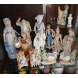 Shelf of Continental porcelain figurines