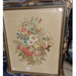Large Victorian woolwork picture of a still life of flowers in ornate gilt gesso and black frame