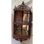 Victorian mahogany corner shelf with mirrored back and fretwork galleries