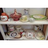 Two shelves of assorted china