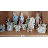 Collection of 14 Continental porcelain and china figurines