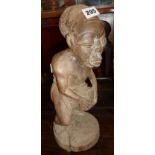 Tribal Art: Old West African carved wood figure of a drummer, probably Yoruba