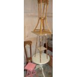 Four various bamboo plant stands and a low painted table