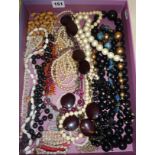 Large tray containing vintage costume jewellery, including Coral