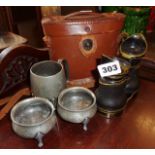 A pair of pre-war Woolensak field/opera glasses in leather case, a pair of pewter salts and a