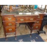 Victorian mahogany breakfront kneehole desk, with galleried top above a single drawer flanked by six