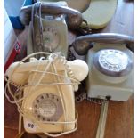 Three 1960s or 70s dial telephones