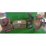 Embossed brass casket, Oriental soapstone carving, small Eastern coffee pot and a resin putti