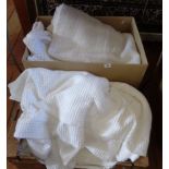 Two large boxes of bed linen