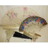Collection of antique fans with ornately pierced ivory sticks etc, the largest fan is from