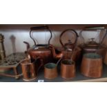Three Victorian copper kettles, three brass 'student' candlesticks and other brass and copperware